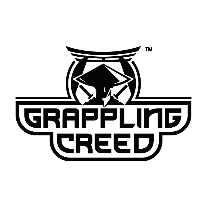 Load video: man wearing grappling creed sparring